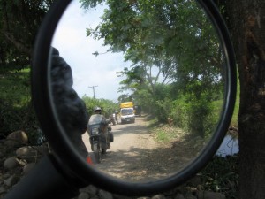 Looking back in El Salvador as my travel buddy is being warned that there are guys up ahead to rob us