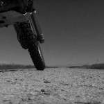 dirtbike on gravel road on Soda Lake Road