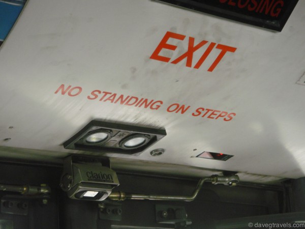 From inside of a bus. The steps wouldn't have enough room to stand and read the sign at the same time