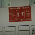 Singapore Signs –  Protected area – theyll shoot you – really