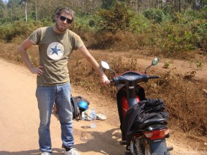This French guy was part of the MANY accidents of backpackers who rent scooters in Laos.  It was very common to see people at hostels hanging out covered in bandages.  If you rent a  scooter, wear safety gear!  This guy who we thought was seriously banged up just had a minor scratch on his leg.  His scooter was unable to continue until we applied a dose of the engineering THWACK (hammer) to the foot peg.