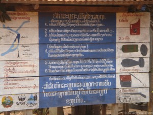 Unfortunately, these signs for Unexploded Ordinance are pretty typical for the Laos countryside.  The US dropped more than 2 million tons of bombs on Laos.