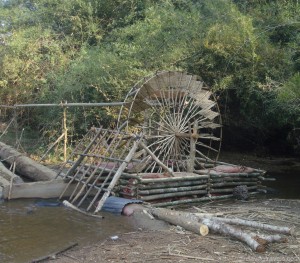 I unfortunatley didn't get a good photo of this machine.  I'm not exactly sure what it does, but I think it pumps water up from the river up the river bank to village.  There was a woman bathing there and giving me the evil eye when I took out the camera so I just quickly snapped this photo with my little sony camera.