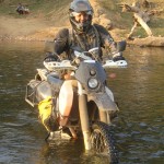 05 Dave pushing moto in Laos Water
